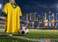 Gramado de estádio com camisa amarela e skyline de Singapura ao fundo